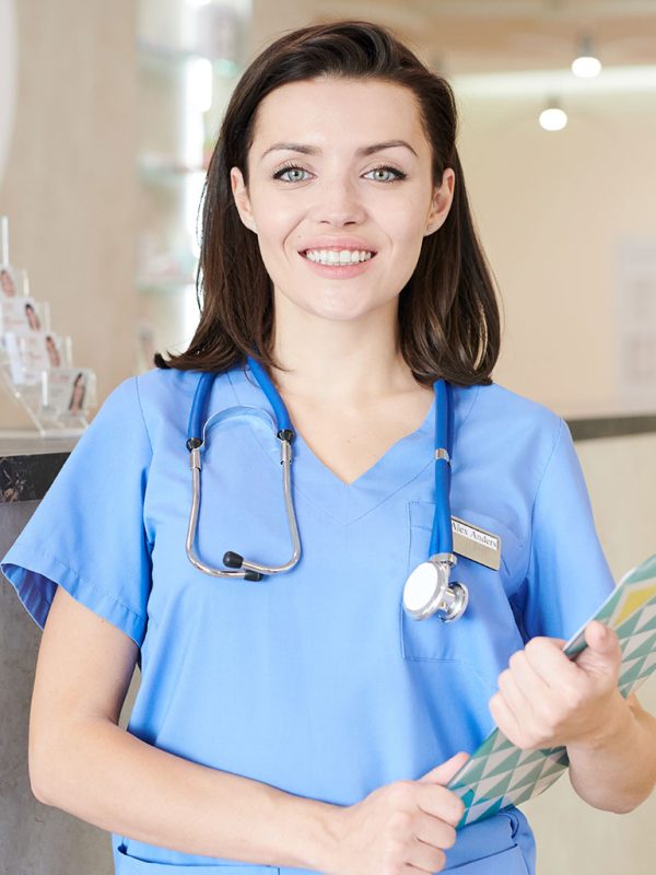 female-nurse-posing-in-clinic-ECY43PX